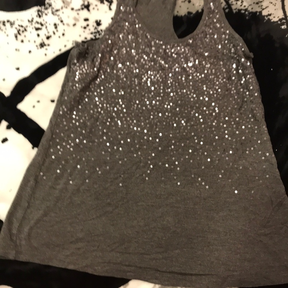 Sparkly grey tank top.